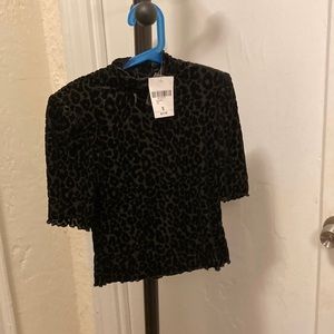 Brand new woman’s black velvet mesh top